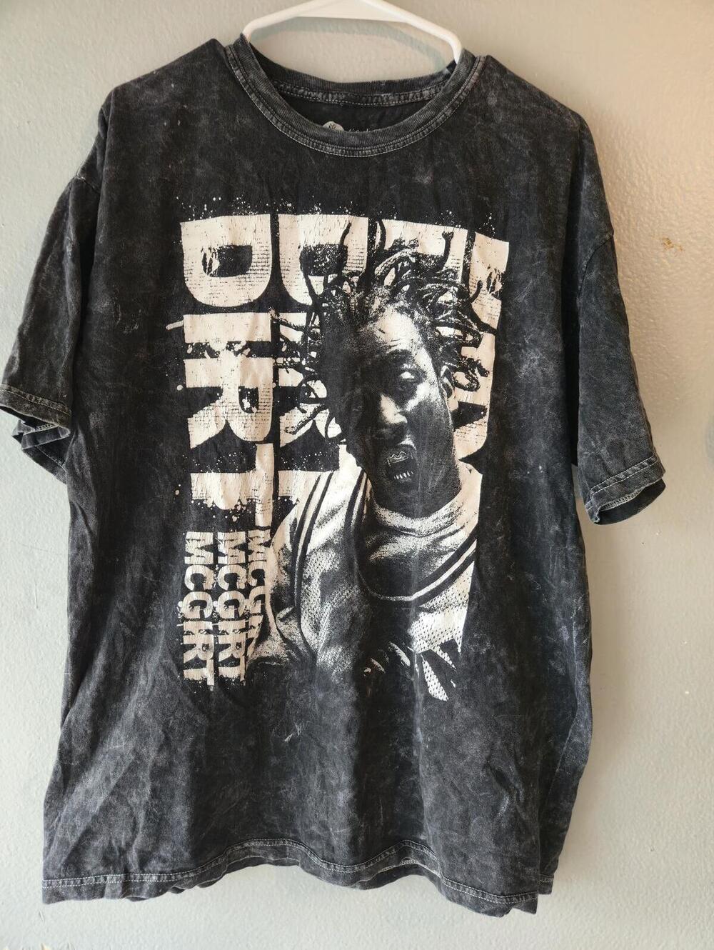 Vintage Style Black Graphic T-Shirt with Distressed Look
